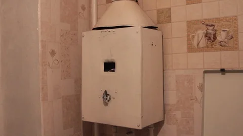 Old Soviet gas boiler Stock Footage 100643819