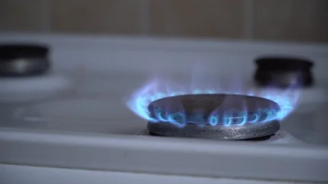 Old soviet gas stove. Fire from the stove. Kindle and extinguish the fire. Stock Footage 119200619