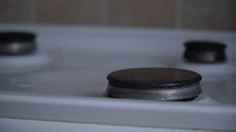 Old soviet gas stove. Fire from the stove. Kindle and extinguish the fire. Stock Footage 119200622