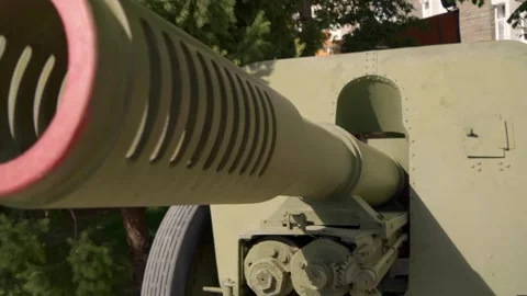 Old soviet howitzer is standing for display in a yard of Military museum Stock Footage 318730796