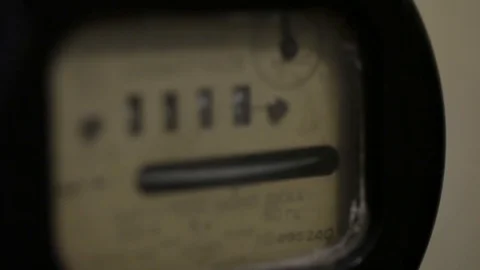Old Soviet mechanical electricity meter on a yellow wall Stock Footage 93849451