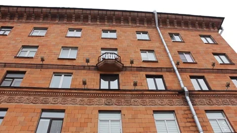 Old soviet orange bricks building Video stock 123893224