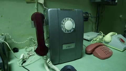 Old Soviet Payphone, Regular Dial Phone and Push Button Phone on Desk Stock Footage 293745393