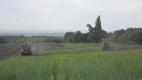 Old soviet tractors working in the field. 4k. Flat pikture profile 스톡 동영상 75819403