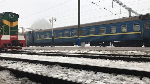 Old soviet train arrives at the station Stock Footage 103737172