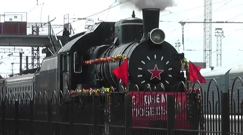 Old soviet train FD-20 moving. The smoke from the chimney. Red flag Stock Footage 47066430