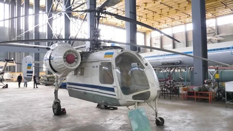 Old Soviet Union helicopter in public avia hangar Stock Footage 296695634