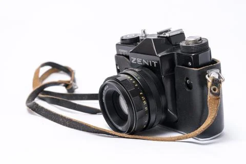 Old Soviet Zenit TLL 35 mm film camera isolated on white with He Stock Photos