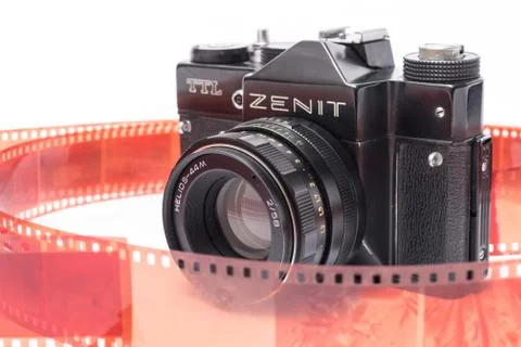Old Soviet Zenit TTL 35 mm film camera isolated on white Stock Photos