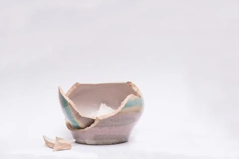 Old split jug on a white background Stock Photos