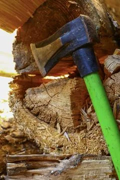 Old splitting axe leaning against stacked firewood showing woodcutting equi.. Stock-Fotos
