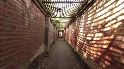 Old spooky passage long walk way zoom in prisoners pov background. Walking .. Vídeos de archivo 308148558