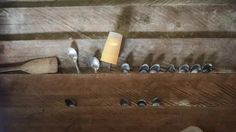 Old Spoons in Wall Boards Stock Photos