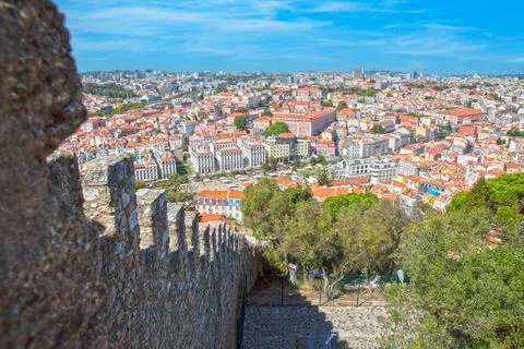 Old square with monument and trees in Lisbon Stock-Fotos