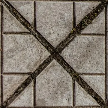 An old square shape from a pavement - gray colored stone pavement Stock Photos