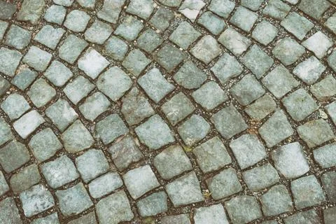 Old square stone built of gray marble geometric pattern background Stock Photos