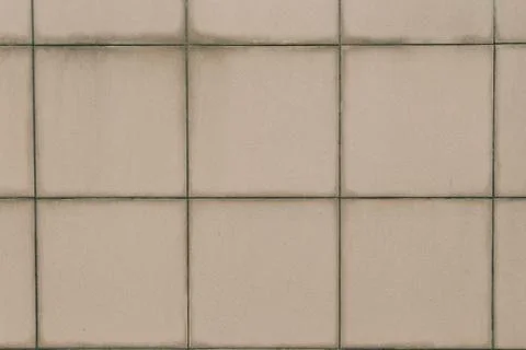 Old square tile with spots background texture Stock Photos