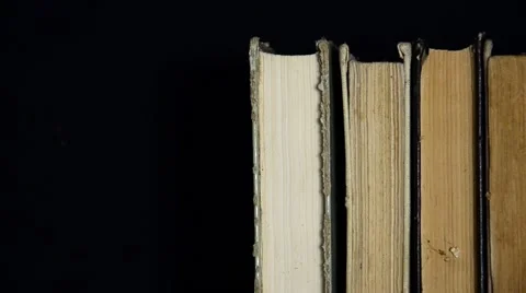 Old stack of books standing in a number of. Old books Video stock 42795691