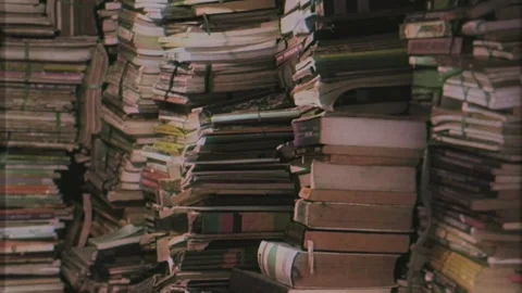 Old Stack of Books Used Magazines Vintage VHS Effect Zoom Out Stock Footage 264588075