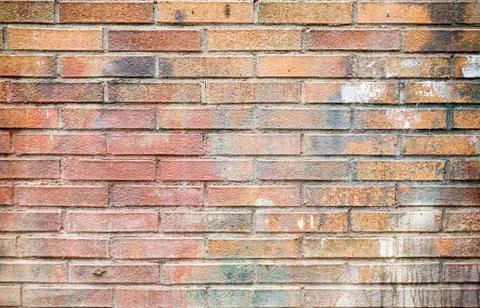 Old stained brick wall backdrop Stock Photos