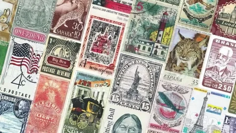 Old Stamps as Background 05 Stock Footage 322145957