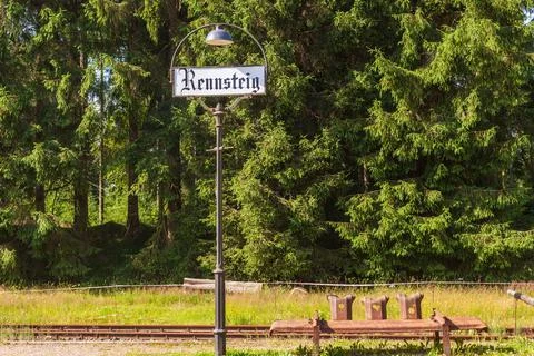 Old station lantern with bench Stock Photos