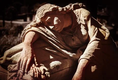 Old statue on grave in Lviv Stock Photos