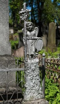 Old statue on grave Stock-Fotos