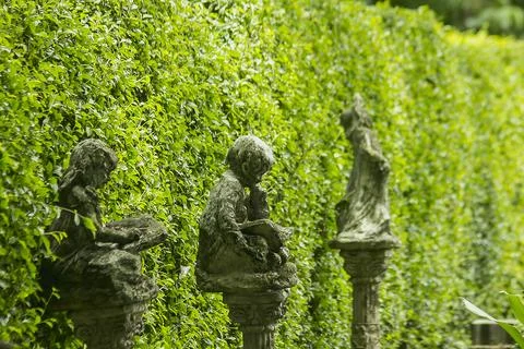 Old statues in the garden Fotos de archivo