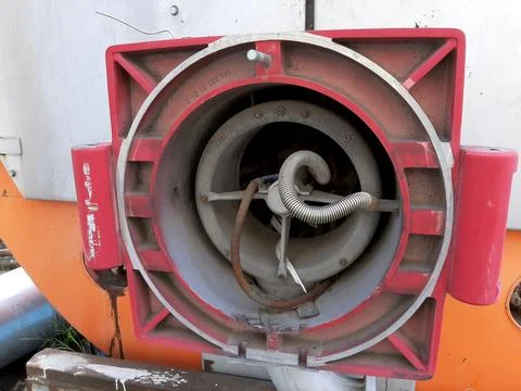 Old Steam Boiler Equipped With a Component of a Gas Burner in an Industrial.. Stock Photos