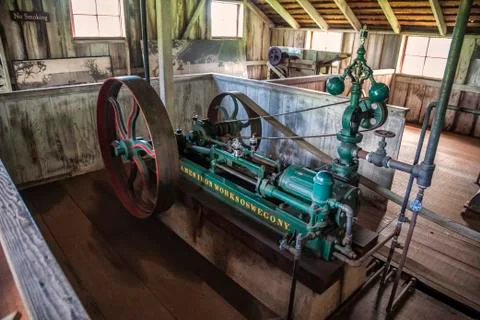 Old steam engine for sugar cane processing on display Stock Photos