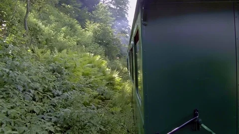 Old steam train going through the mountains Stock-Footage 113562110