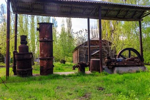 Old steaming threshing machine in Open air Museum of Folk Architecture Stock Photos
