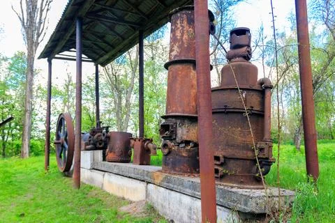 Old steaming threshing machine in Open air Museum of Folk Architecture Stock Photos