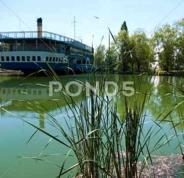 Old steamship on water Stock Photos