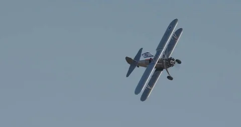 Old Stearman plane doing aerobatics show Stock Footage 77280623