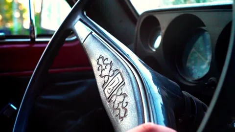An old steering wheel of retro classic car in sunlights. Stock Footage 303880840