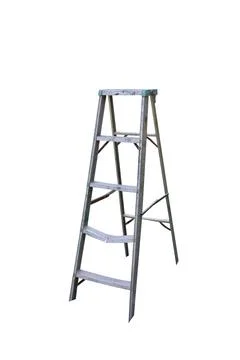 Old stepladder isolated on white background with clipping path included. Fotos de archivo