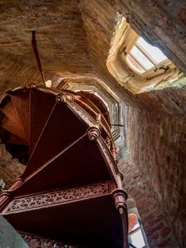 Old steps down from the red brick of the old lighthouse in Lithuania, Klaiped Stock Photos