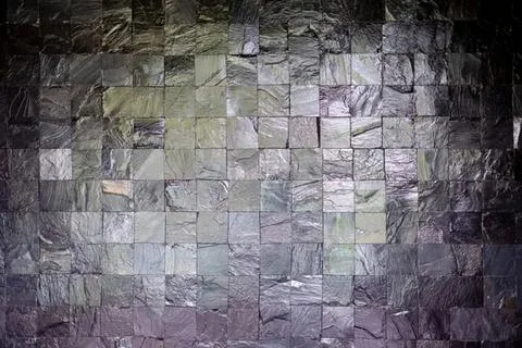 Old stone brick wall with rough texture and dark background Stock Photos