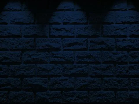 Old Stone Brick Wall with Three Blue Spotlight Beams from the Top. Stock Photos