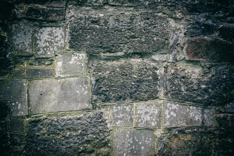 Old stone bricks wall texture background. Stock Photos