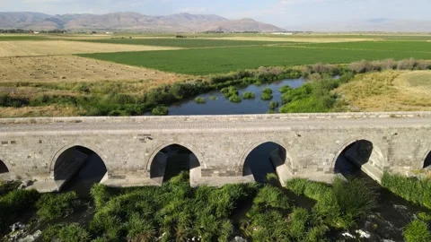 Old stone bride over river Stock Footage 240754790
