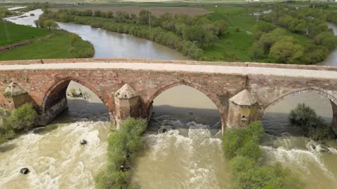 Old stone bride over river Stock Footage 242315665