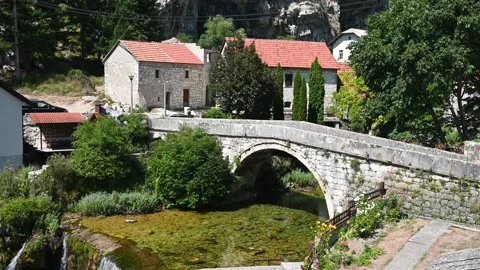 Old stone bridge above the river. Stock Footage 281003547