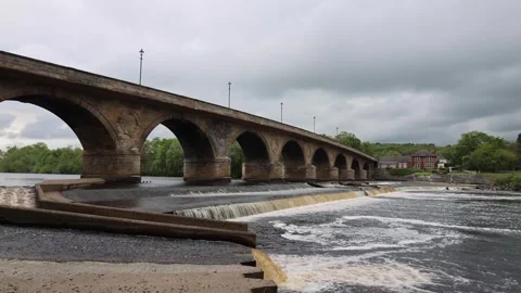 Old Stone Bridge With Arches Across the River Stock Footage 246938530