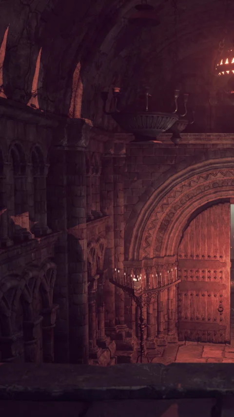 Old stone building with arches and large wooden doors inside a dark space Stock Footage 343180792