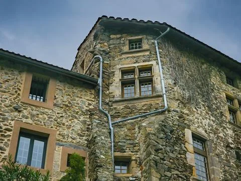Old stone building facade with windows in Malleval, France October 4, 2025 Stock-Fotos