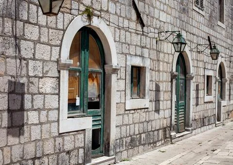 Old stone building texture background street view wall Stock Photos