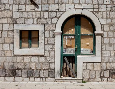 Old stone building texture background street view wall Stock Photos